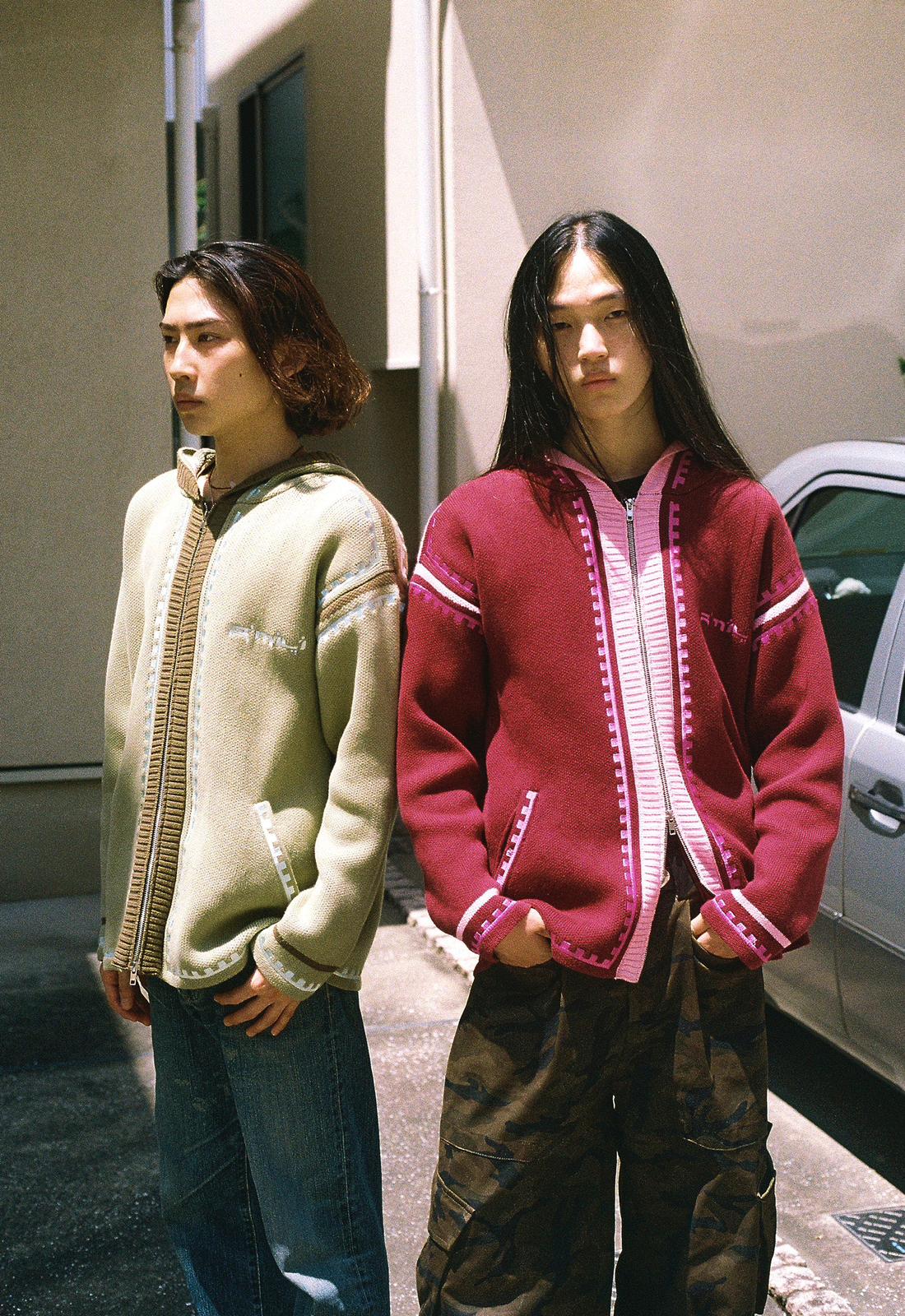 Japanese boys wearing R'mili Berbere Knitwear Jackets in green and burgundy, Tokyo