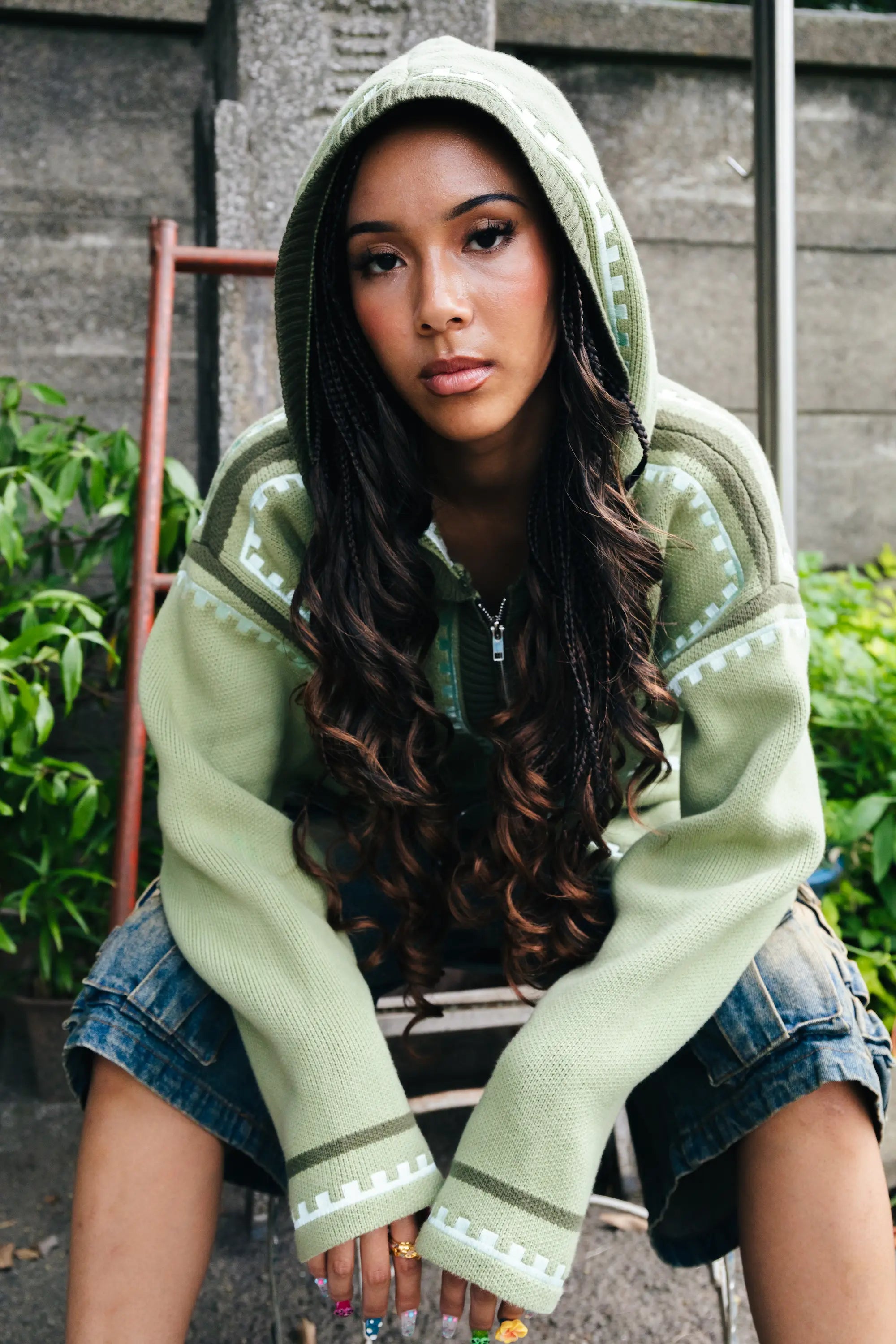 A girl wearing R'MILI Berbere Knitwear Jacket in green, Tokyo 